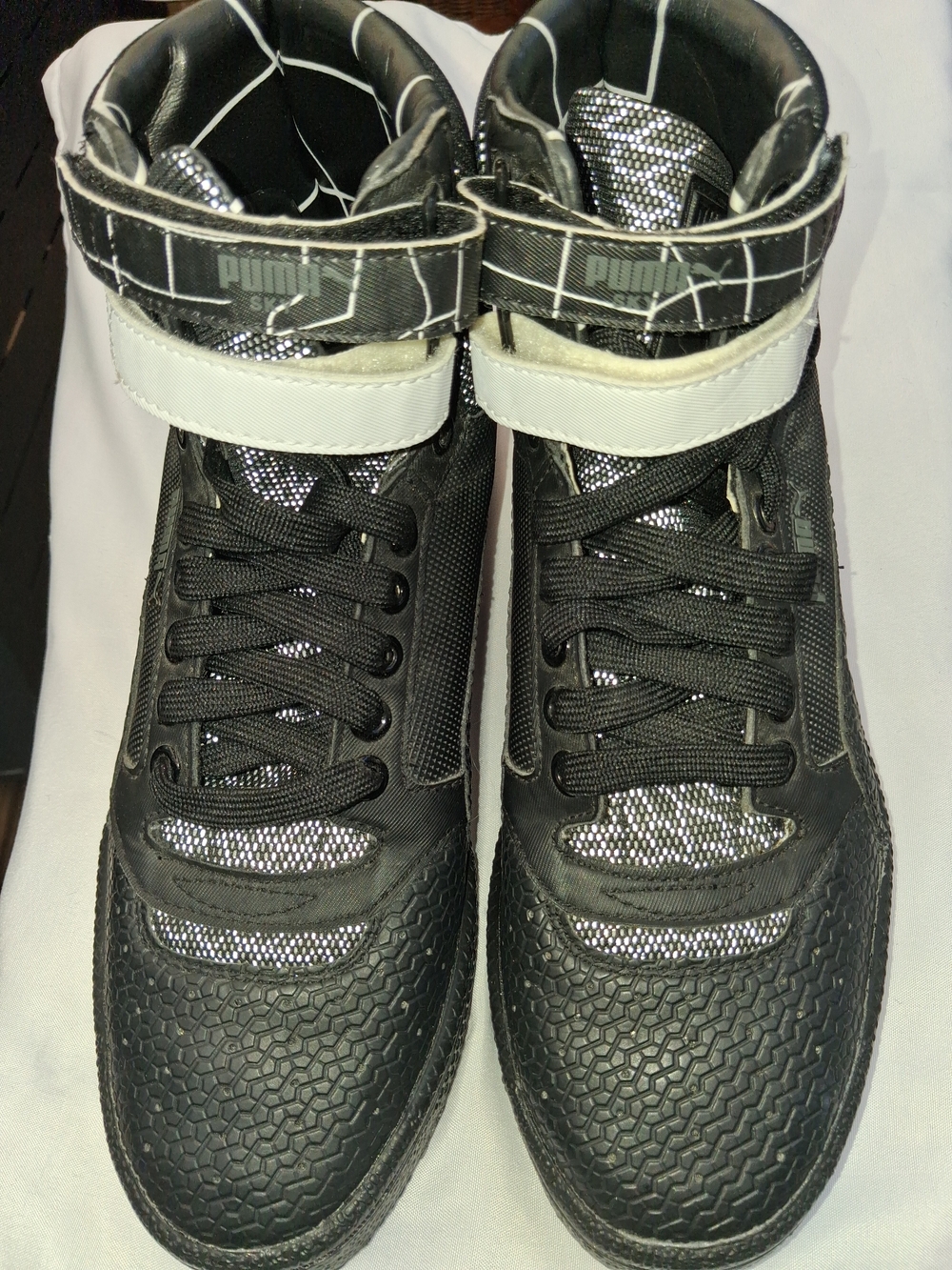 Puma Black High-Top Sneakers with White Strap Accent